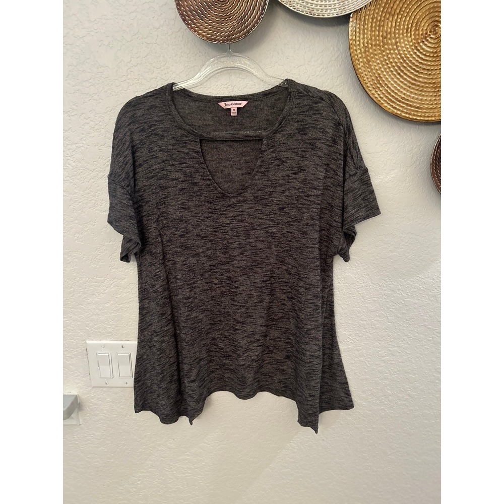 Juicy Couture tee featuring a cutout neckline and an inverted hem in size M